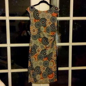 Dress 3 quarter length with high slit dark lined to waist, subtle and sexy